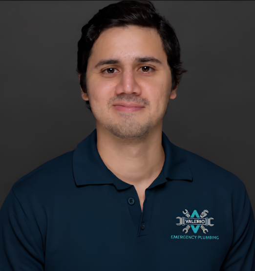 Professional headshot of Jose Bermudez, Director of Digital Marketing, wearing a Valerio Emergency Plumbing navy polo shirt